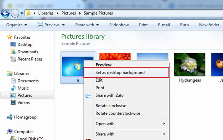 Cài hình nền laptop Win 10 chọn hình ảnh trực tiếp trong ablum ảnh lưu về máy tính, laptop click chuột phải Chọn Set as desktop background