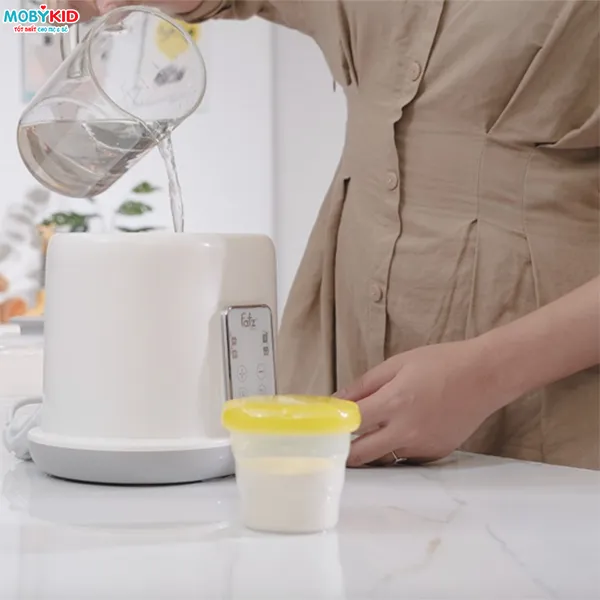 Tác dụng của máy hâm sữa và những điều mẹ cần biết để có bình sữa thơm ngon cho bé